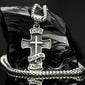 925 sterling silver Walk by Faith cross necklace with 3mm box chain. Silver cross necklace with 'Faith Walk By Faith' text on a reflective surface