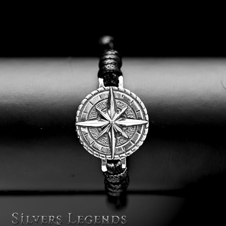 Silver compass pendant on a black leather cord with 'Silvers Legends' . Adjustable  bracelet for men black calf leather branding.