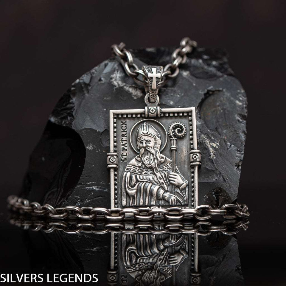 Saint Patrick “Apostle of Ireland” pendant, Shamrock mens medal symbolized St Patrick was a fifth-century Romano-British Christian missionary and bishop in Ireland. St Patrick tile medallion is Sterling silver 925 Irish orthogonal charm, symbol of faith. Known as the “Apostle of Ireland”, he is the primary patron saint of Ireland. Check out other best handcrafted sterling silver men's jewelry at silverslegends.com