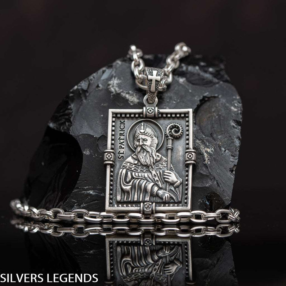 Saint Patrick “Apostle of Ireland” pendant, Shamrock mens medal symbolized St Patrick was a fifth-century Romano-British Christian missionary and bishop in Ireland. St Patrick tile medallion is Sterling silver 925 Irish orthogonal charm, symbol of faith. Known as the “Apostle of Ireland”, he is the primary patron saint of Ireland. Check out other best handcrafted sterling silver men's jewelry at silverslegends.com