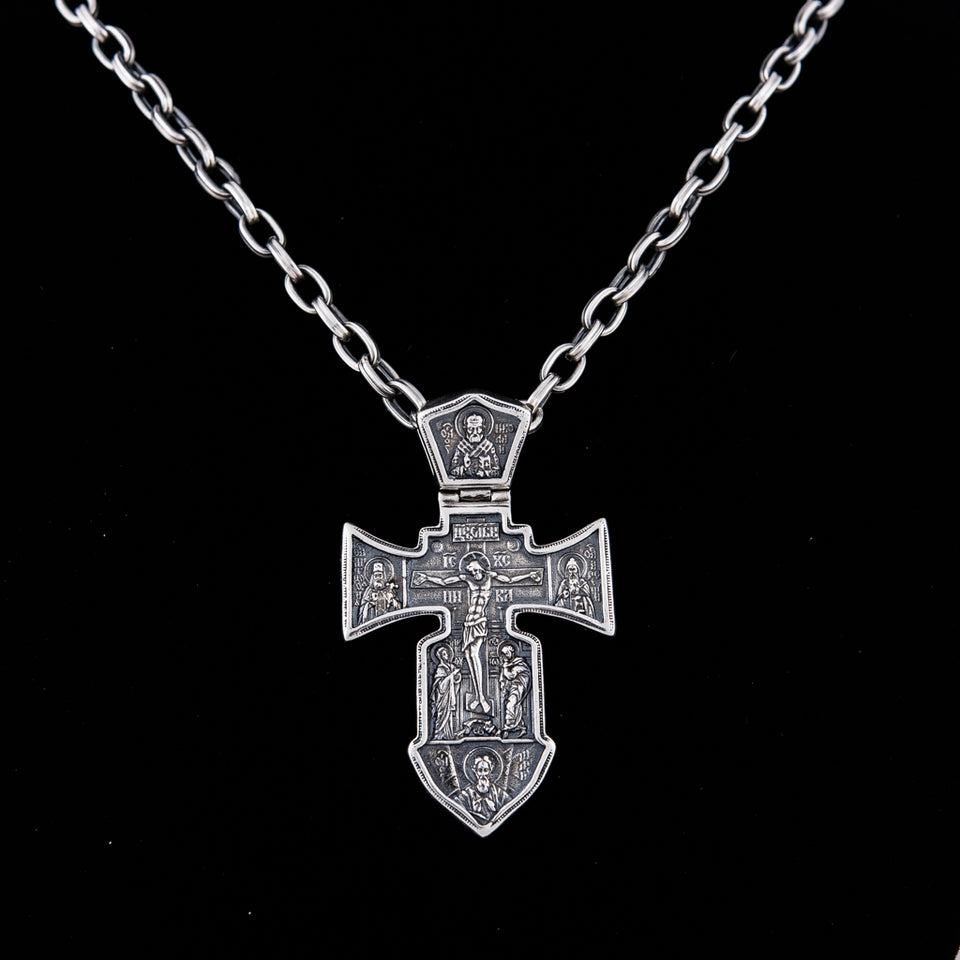 Silver Men’s Cross "Crucifixion and Guardian Angel-Michael the Archangel" is handmade, double sided cross pendant for men, from one side is Lord Jesus Christ- Crucifixion, from the other is Arhangel Michael - Guardian Angel. The lewel is with shape of sword and it’s men's solid silver pendant, you can have it with silver chain necklace. This Christian silver jewel is with beautiful details and amazing artwork. Check out other best handcrafted sterling silver men's jewelry at silverslegends.com