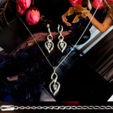 Charm sterling silver 925 jewelry set of stylish dangling and curved pendant, dainty chain necklace and earrings, made with shining zircon stylish design. Elegant silver jewelry female set, made with shining zircon, perfect choice as a fancy gift to your girlfriend, wife, mom, or female friends at Easter, anniversary, engagement, party, meeting, dating, wedding or usual wear. Hypoallergenic sterling silver necklace set, allergy-free. Check out other elegant jewelry for women at silverslegends.com...