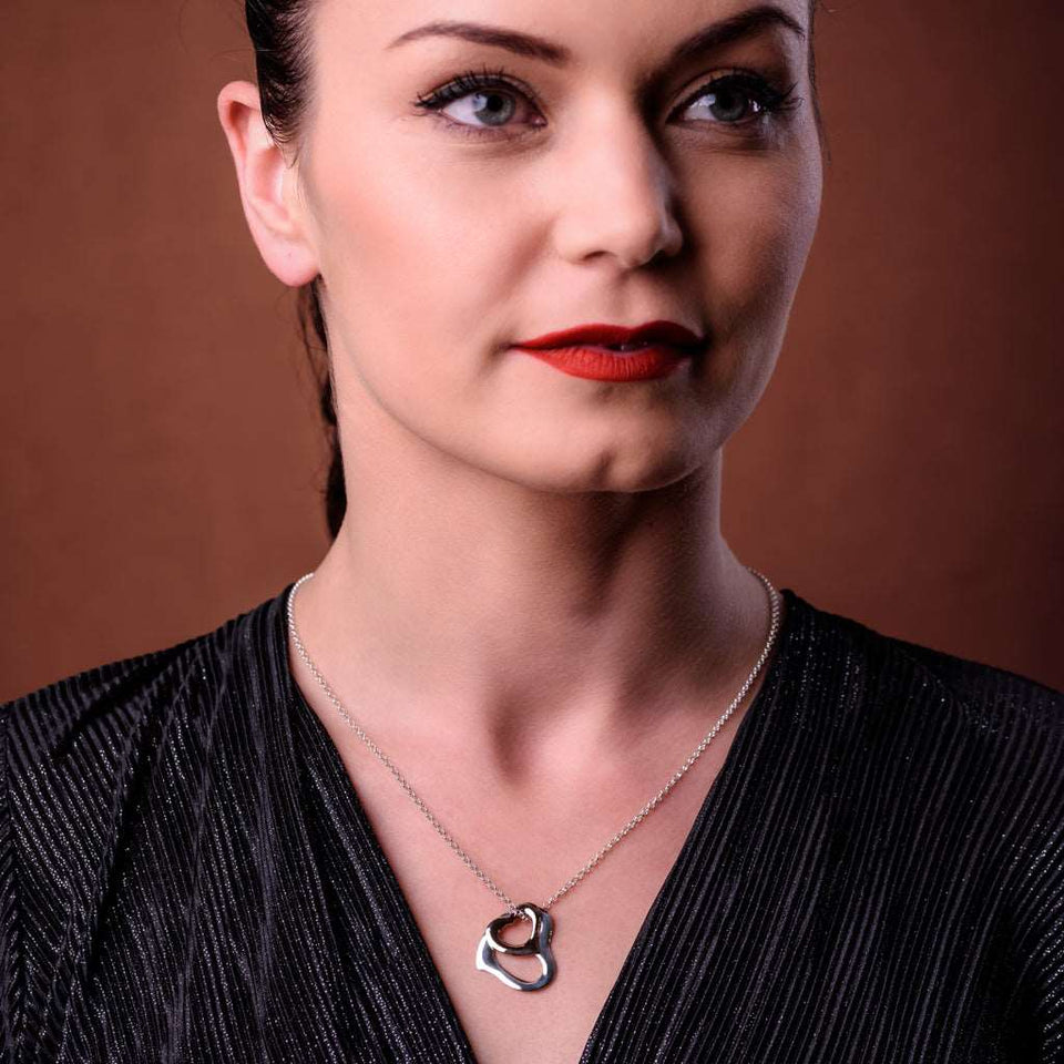 Sterling Silver And 18k Rose Gold Plated Dianty Two Hearts Pendant Necklace is fine jewelry with double heart, perfect choice as a fancy gift to your girlfriend, wife, mom, or female friends at Easter, anniversary, engagement, party, meeting, dating, wedding or usual wear. Check out other elegant jewelry for women at silverslegends.com...