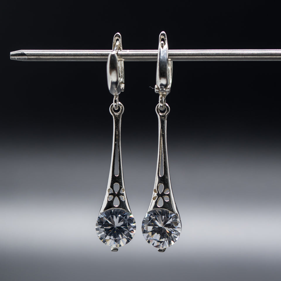 Sterling Silver 925 dangling teardrop-shaped set of pendant, necklace and earrings made with shining light blue zircon stylish design. Elegant silver jewelry female set, made with shining zircon, perfect choice as a fancy gift to your girlfriend, wife, mom, or female friends at Easter, anniversary, engagement, party, meeting, dating, wedding or usual wear. Hypoallergenic sterling silver necklace set, allergy-free. Check out other elegant jewelry for women at silverslegends.com...