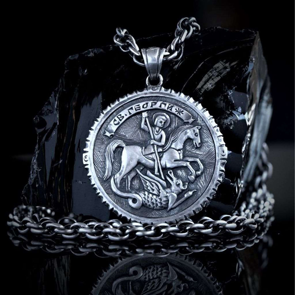Sterling silver 925 men's pendant Saint George and the Serpent with a prayer is handmade religious jewelry and you can have it with silver rope chain necklace. Silver medallion St. George slaying the dragon is an amulet and a symbol of protection and it will suit with every men's style, St George locket is a perfect gift for him.