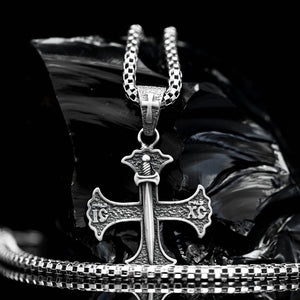 Sterling Silver 925 Templar Cross pendant featuring a finely detailed sword overlay and an inscribed prayer. The pendant showcases the Templar cross with its distinctive broad arms, and the sword symbolizes the knights' strength and honor. The prayer is intricately etched along the borders, adding a spiritual touch to this unique piece of jewelry