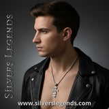 Man wearing a black leather jacket with a silver necklace on a gray background, featuring 'Silvers Legends' branding, Faith and Strength Pendant – Silver Men’s Cross Jewelry Gift for Christian Men