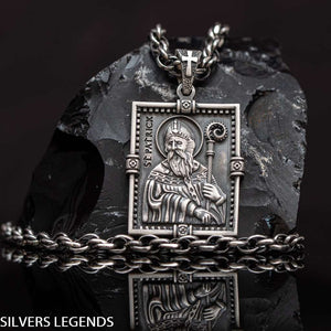 Saint Patrick “Apostle of Ireland” pendant, Shamrock mens medal symbolized St Patrick was a fifth-century Romano-British Christian missionary and bishop in Ireland. St Patrick tile medallion is Sterling silver 925 Irish orthogonal charm, symbol of faith. Known as the “Apostle of Ireland”, he is the primary patron saint of Ireland. Check out other best handcrafted sterling silver men's jewelry at silverslegends.com