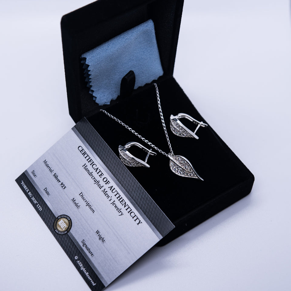 Set of silver pendant necklace and earrings "Leaf" - Charm silver jewelry female set, made with shining zircon, perfect choice as a fancy gift to your girlfriend, wife, mom, or female friends at Easter, anniversary, engagement, party, meeting, dating, wedding or usual wear. Beautiful, Hypoallergenic sterling silver jewelry set, suitable for almost all of sensitive skins. Check out other elegant jewelry for women at silverslegends.com...