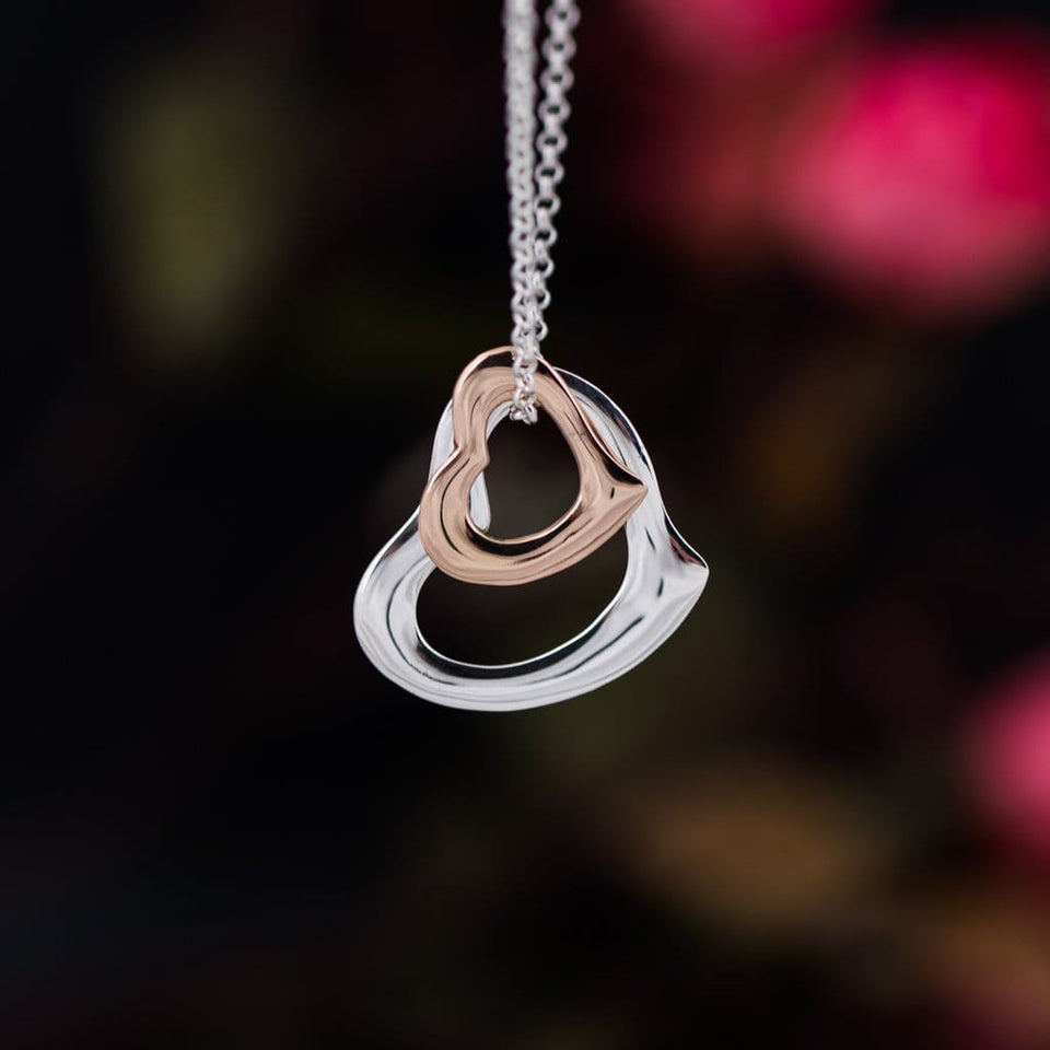 Sterling Silver And 18k Rose Gold Plated Dianty Two Hearts Pendant Necklace is fine jewelry with double heart, perfect choice as a fancy gift to your girlfriend, wife, mom, or female friends at Easter, anniversary, engagement, party, meeting, dating, wedding or usual wear. Check out other elegant jewelry for women at silverslegends.com...
