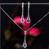 Sterling Silver 925 dangling teardrop-shaped set of pendant, necklace and earrings made with shining light blue zircon stylish design. Elegant silver jewelry female set, made with shining zircon, perfect choice as a fancy gift to your girlfriend, wife, mom, or female friends at Easter, anniversary, engagement, party, meeting, dating, wedding or usual wear. Hypoallergenic sterling silver necklace set, allergy-free. Check out other elegant jewelry for women at silverslegends.com...