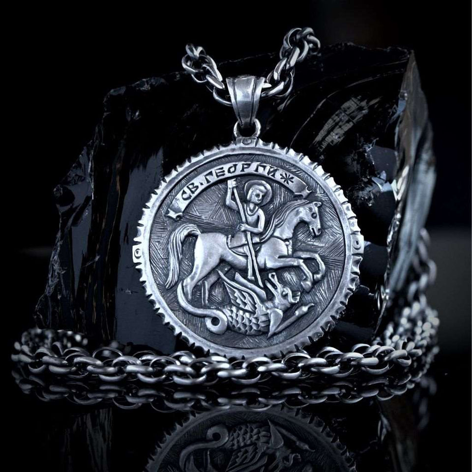 Sterling silver 925 men's pendant Saint George and the Serpent with a prayer is handmade religious jewelry and you can have it with silver rope chain necklace. Silver medallion St. George slaying the dragon is an amulet and a symbol of protection and it will suit with every men's style, St George locket is a perfect gift for him. 